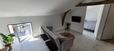 Télévision ou salle de divertissement dans l'établissement Appartement proche Futuroscope