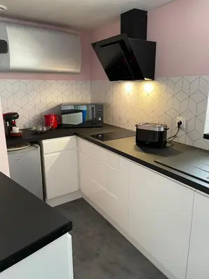 Cuisine ou kitchenette dans l'établissement Renette