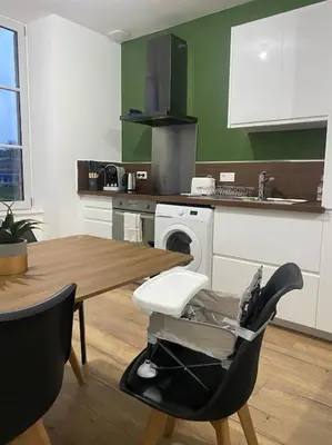 Cuisine ou kitchenette dans l'établissement Le Duplex Tout Confort