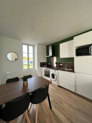 Cuisine ou kitchenette dans l'établissement Le Duplex Tout Confort