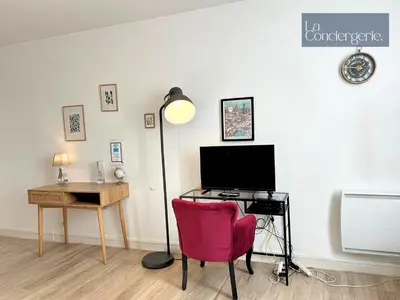 Télévision ou salle de divertissement dans l'établissement Le Grand'rue - Centre Ville - Confort