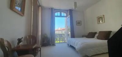 Un ou plusieurs lits dans un hébergement de l'établissement Villa Art Nouveau