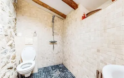Salle de bains dans l'établissement Le Vieux Fournil