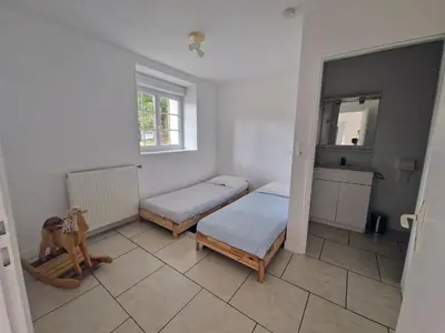 Un ou plusieurs lits dans un hébergement de l'établissement La Source, location saisonnière proche Cognac