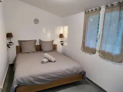 Un ou plusieurs lits dans un hébergement de l'établissement Maison cocooning