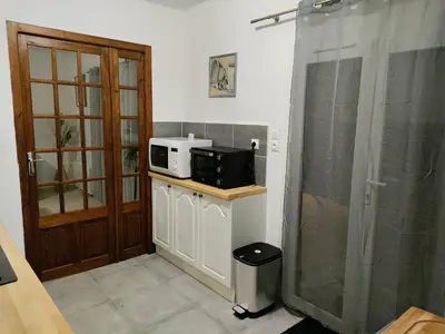 Cuisine ou kitchenette dans l'établissement Maison cocooning