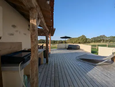 Balcon ou terrasse dans l'établissement Gîte à l'ombre des Magnolias