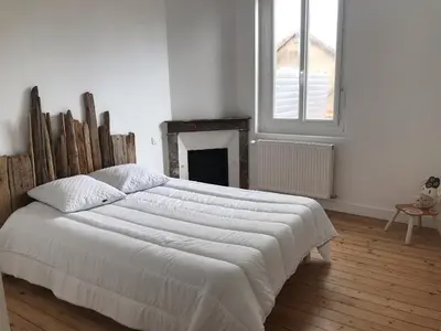 Un ou plusieurs lits dans un hébergement de l'établissement Maison de vacances