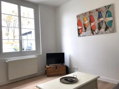 Télévision ou salle de divertissement dans l'établissement Maison de vacances