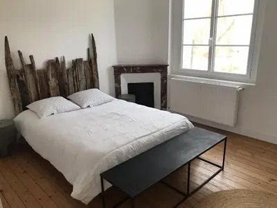 Un ou plusieurs lits dans un hébergement de l'établissement Maison de vacances