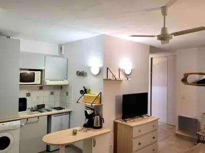 Cuisine ou kitchenette dans l'établissement Le Coin du Curiste - Port de Plaisance