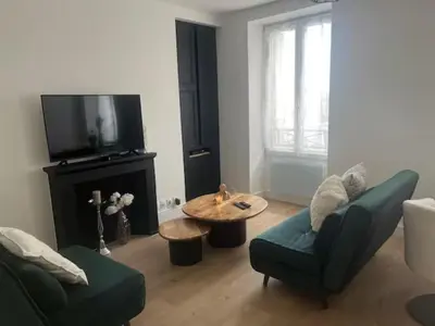 Télévision ou salle de divertissement dans l'établissement Charmant T2 - Plein centre ville