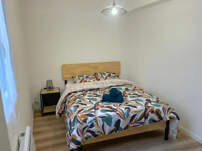 Un ou plusieurs lits dans un hébergement de l'établissement ღ Le Saintois • Au cœur de ville, Spacieux & Wifi