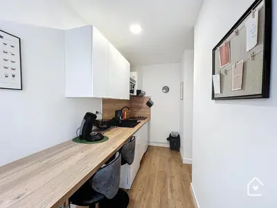 Cuisine ou kitchenette dans l'établissement Les bords du Clain - Entrée Autonome Studio