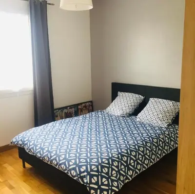Un ou plusieurs lits dans un hébergement de l'établissement Maison à proximité du Futuroscope