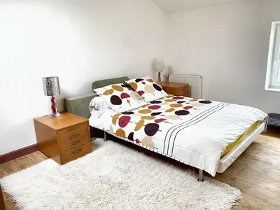 Un ou plusieurs lits dans un hébergement de l'établissement Villa spacieuse à Prailles-La Couarde avec piscine privée 100 m² !