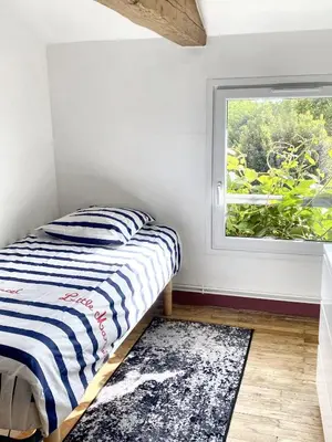 Un ou plusieurs lits dans un hébergement de l'établissement Villa spacieuse à Prailles-La Couarde avec piscine privée 100 m² !