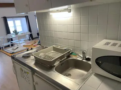 Cuisine ou kitchenette dans l'établissement ღ Marché Central • Au cœur de ville & Spacieux