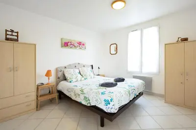 Un ou plusieurs lits dans un hébergement de l'établissement Villa Vanille
