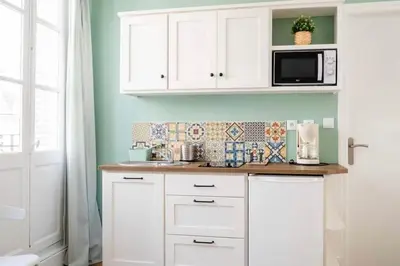 Cuisine ou kitchenette dans l'établissement Le Ferdinand T2 en hypercentre