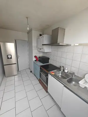 Cuisine ou kitchenette dans l'établissement Chambre Poitiers
