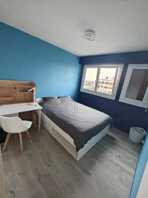 Un ou plusieurs lits dans un hébergement de l'établissement Chambre Poitiers
