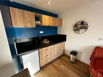 Cuisine ou kitchenette dans l'établissement Le Songe bleu - centre ville - netflix