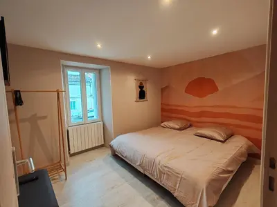 Un ou plusieurs lits dans un hébergement de l'établissement MaisonnetteAu36-centre-parking-cosy