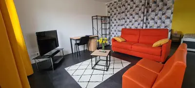 Télévision ou salle de divertissement dans l'établissement loft près futuroscope