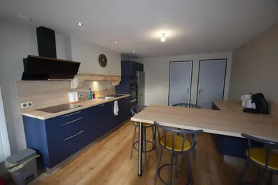 Cuisine ou kitchenette dans l'établissement Gîte de Bena
