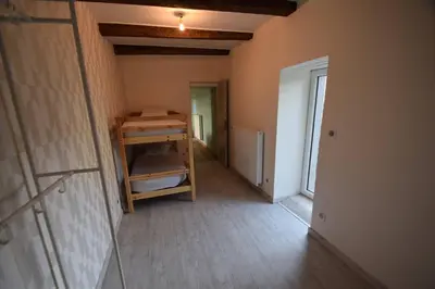 Un ou plusieurs lits dans un hébergement de l'établissement Gîte de Bena