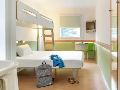 Un ou plusieurs lits dans un hébergement de l'établissement ibis budget Poitiers Sud