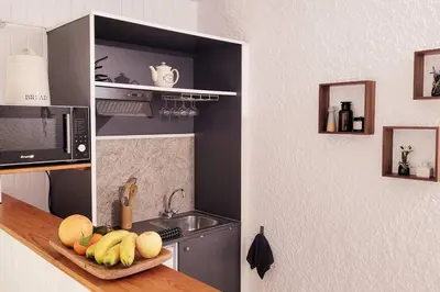 Cuisine ou kitchenette dans l'établissement Le Studio 360 Proche Futuroscope & Arena 1/4 Pers
