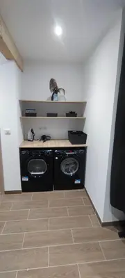 Cuisine ou kitchenette dans l'établissement Charmante maison de plain-pied