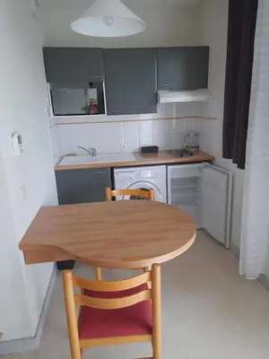 Cuisine ou kitchenette dans l'établissement La P'tite Escale