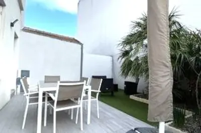 Jardin de l'établissement Appartement avec terrasse