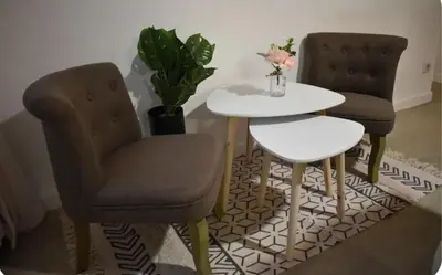 Coin salon dans l'établissement Joli apartment proche du centre-ville
