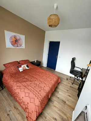 Un ou plusieurs lits dans un hébergement de l'établissement Maison spacieuse jardin Transat - Parking gratuit