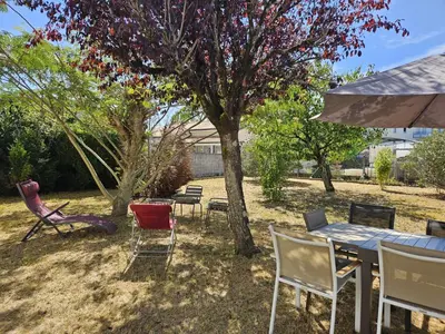 Jardin de l'établissement Maison spacieuse jardin Transat - Parking gratuit