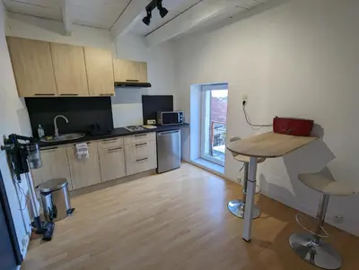 Cuisine ou kitchenette dans l'établissement La maison de Joe