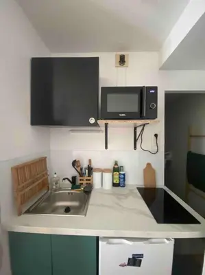 Cuisine ou kitchenette dans l'établissement Appartement en face de la gare - centre ville