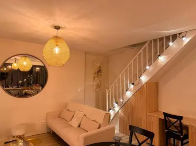 Coin salon dans l'établissement Maison + parking privé au Cœur Angoulême 60m2