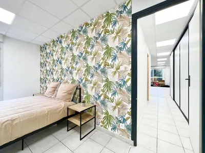 Un ou plusieurs lits dans un hébergement de l'établissement Le Grand Penon ~ Logement Spacieux à 6 min du Parc