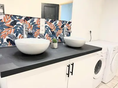 Cuisine ou kitchenette dans l'établissement Le Grand Penon ~ Logement Spacieux à 6 min du Parc
