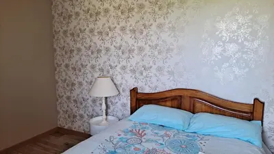 Un ou plusieurs lits dans un hébergement de l'établissement Chambre à la campagne
