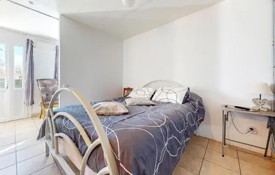 Un ou plusieurs lits dans un hébergement de l'établissement Cozy Home In Montmorillon With Wi-Fi