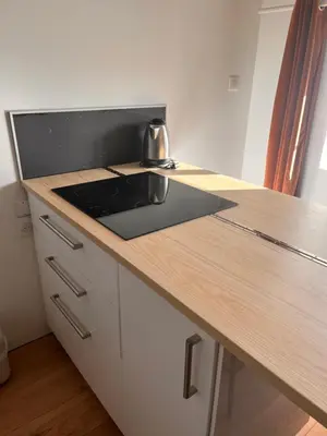 Cuisine ou kitchenette dans l'établissement Résidence de l'houmeau - proche gare