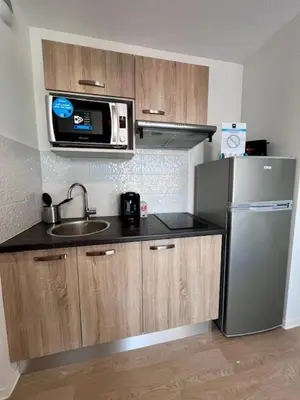 Cuisine ou kitchenette dans l'établissement UXCO Le Spot