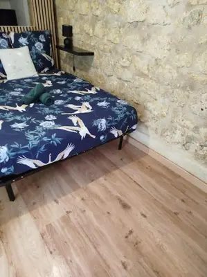 Un ou plusieurs lits dans un hébergement de l'établissement Cosy Bellamy