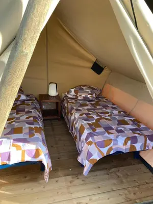 Un ou plusieurs lits dans un hébergement de l'établissement Lodge atypique